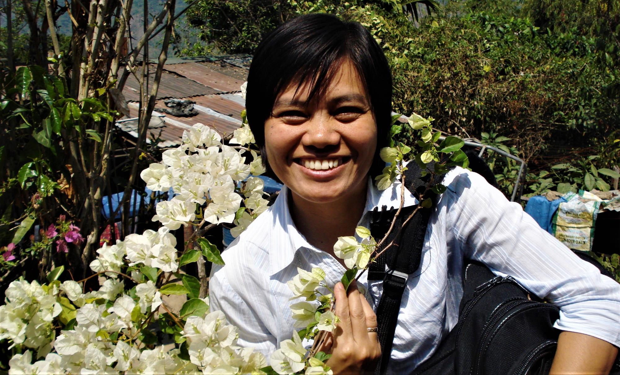 Sister Agustina enjoys white flowers