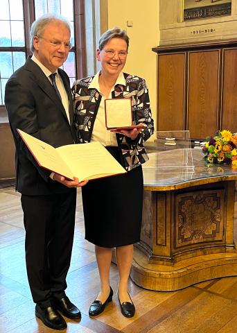 Dr Sister Maria Goetzens receives her award