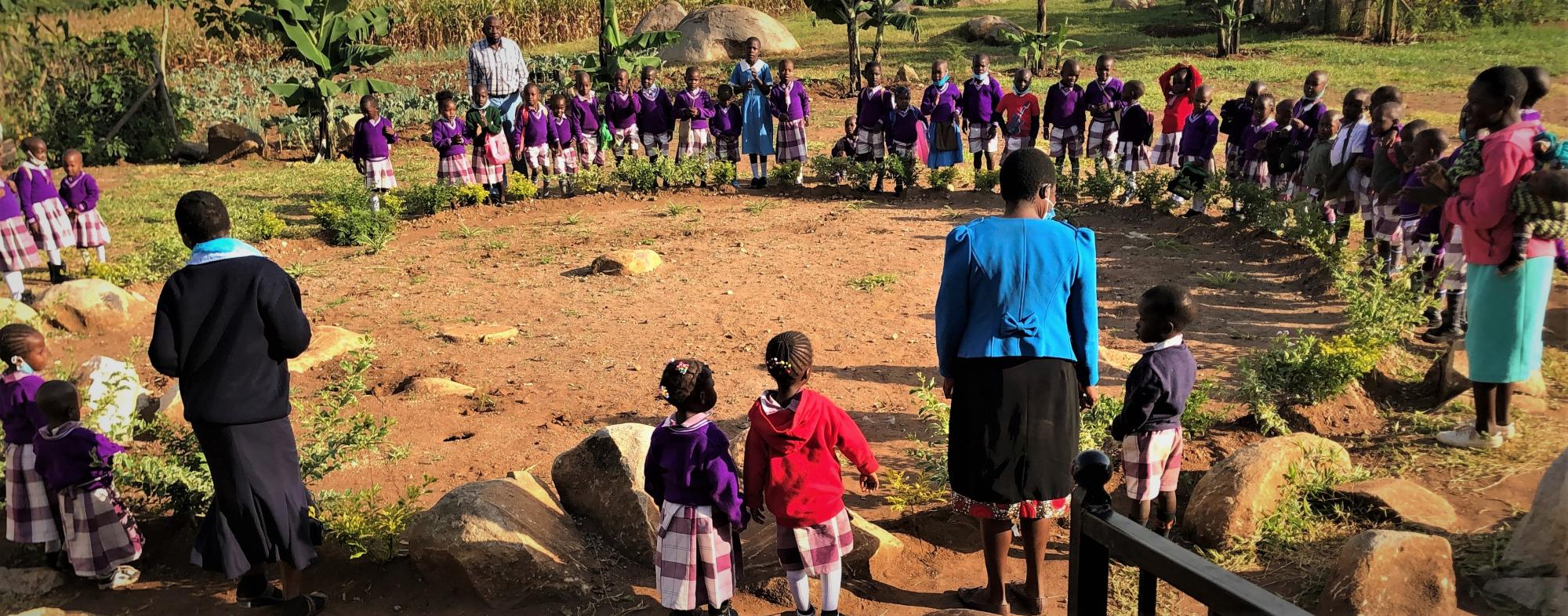 Children at school form a big circle