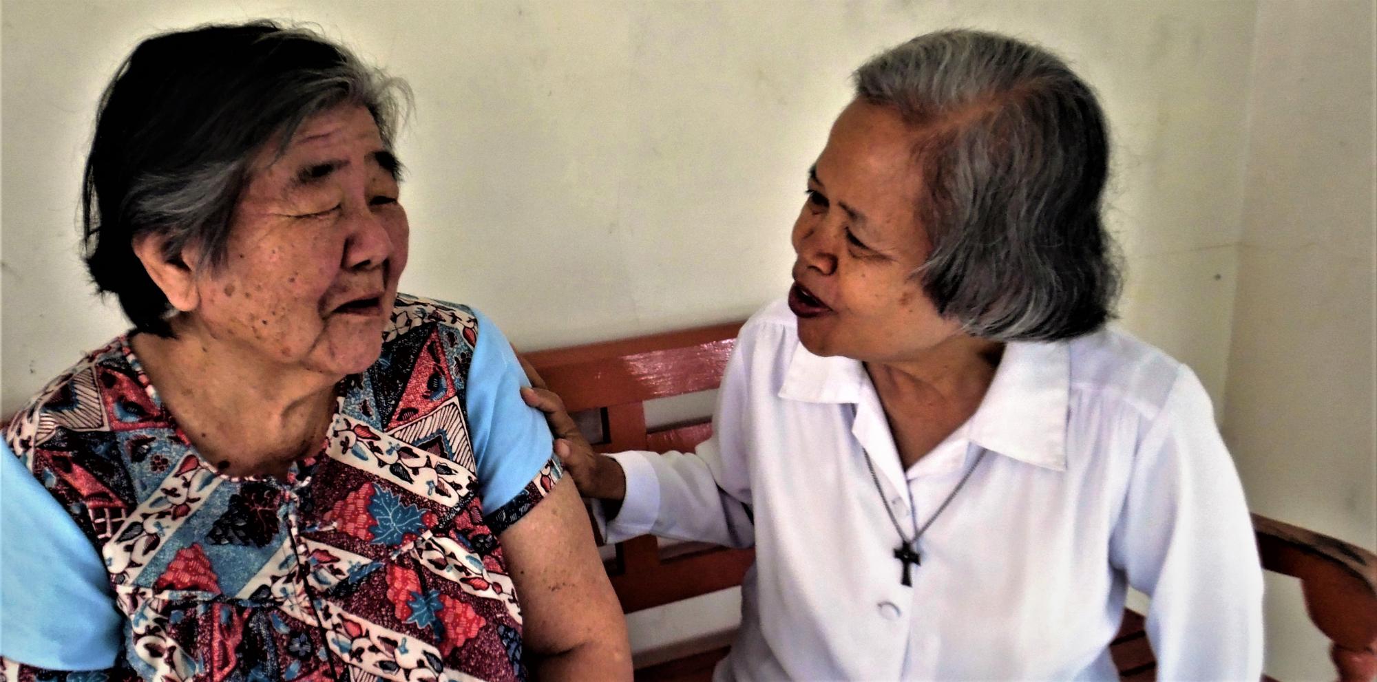 Visiting an elderly resident of a home in Kadipiro Solo