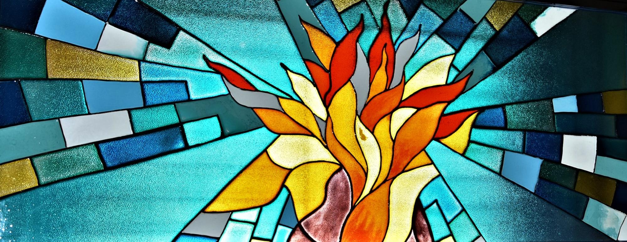 A stained glass window of fire at the Eco-Health and Healing Centre, Pune, India