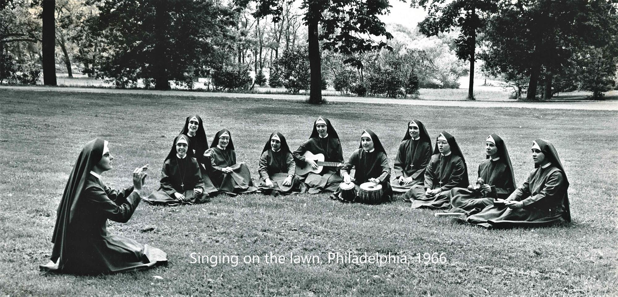 Singing on the lawn, Philadelphia, 1966