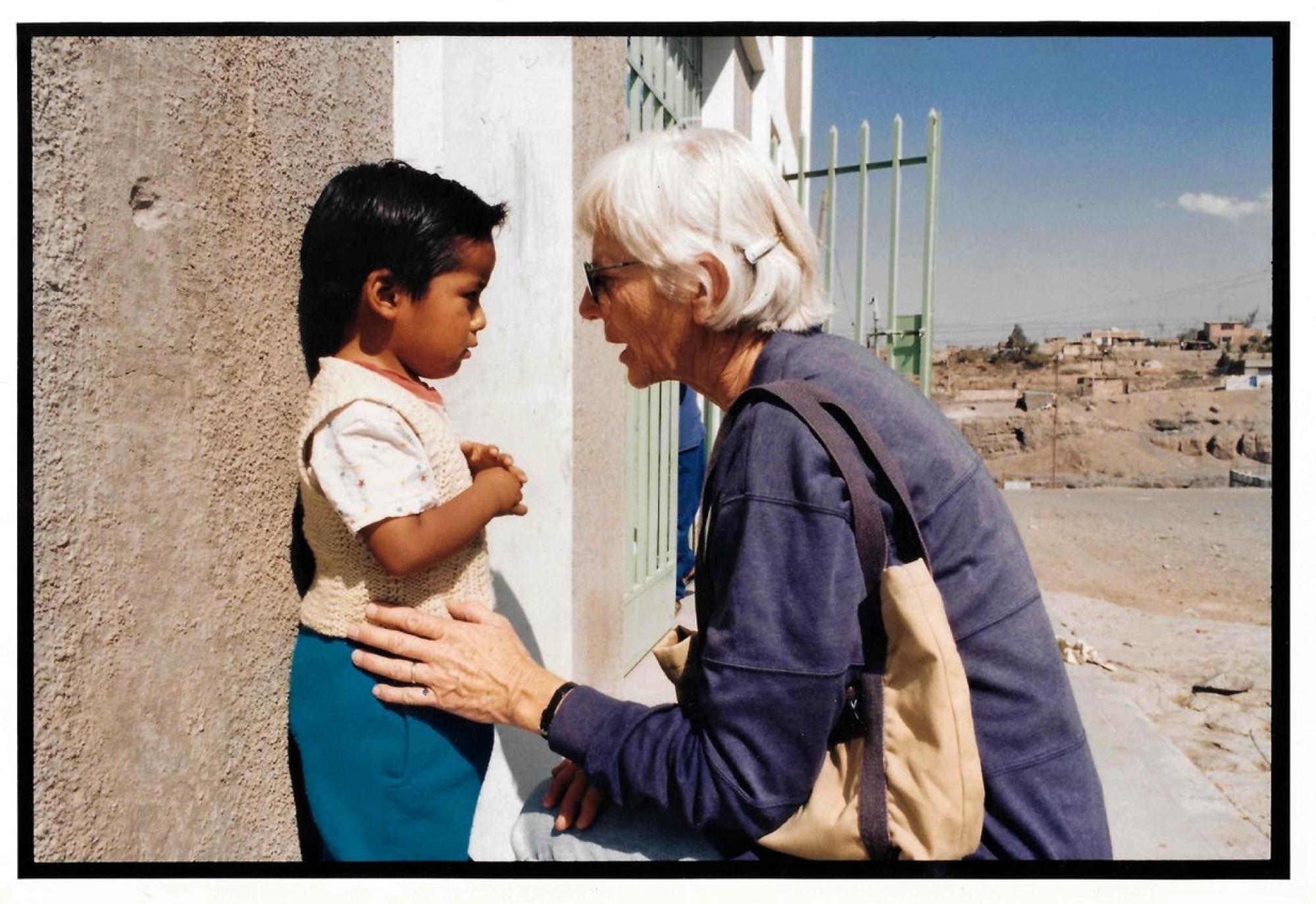 A Medical Mission Sister with a child at the US-Mexico border