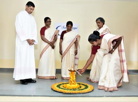 Lighting the lamp at the community in Pune