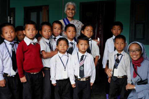 Sister Agnes Marie and Sister Yumiko with pupils of Don Bosco elementary school in Manipur