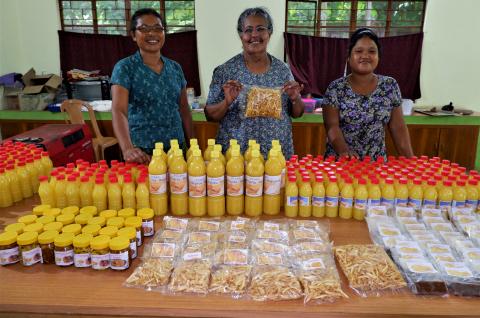 Sister Rose and Cooperative members with products made from jackfruit