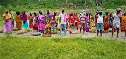People participating in a food for work programme in Hajipur