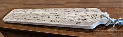 Wood engraved with sisters' names