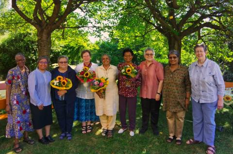 The newly elected Society Leadership Team members stand with the present ones