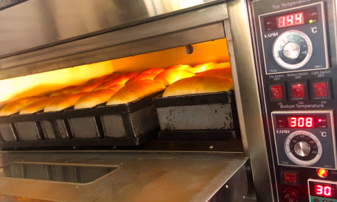 Bread bakes in the solar-powered oven