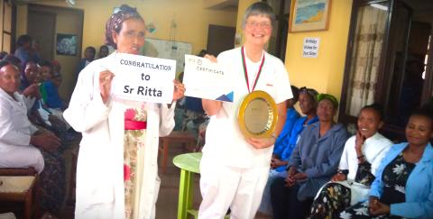 Sister Rita Schiffer receives an award