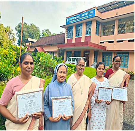 Receiving diplomas in Integrative Healing and Alternative Therapies