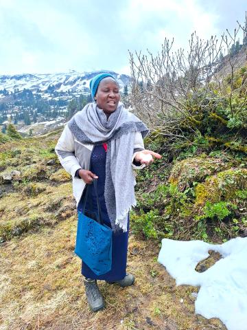 Sister Rosemary Adhiambo touching snow for the very first time