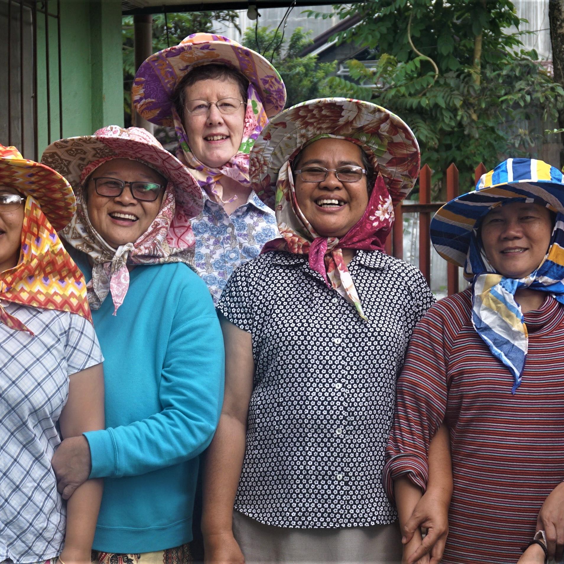 Wearing traditional hats in The Philippines