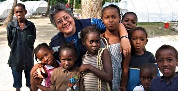 Sister Mafe's visit to Africa is enjoyed by a group of children